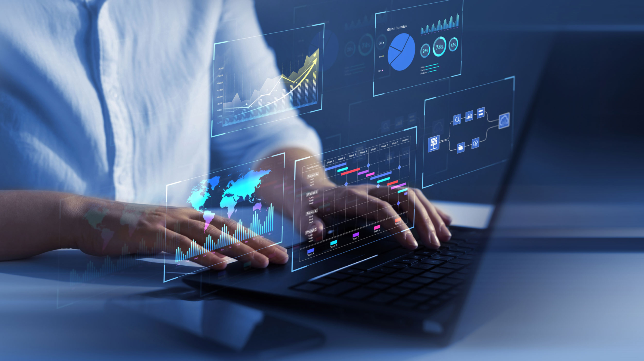 Person, die einen Laptop mit digitalen Datentabellen und Diagrammen über der Tastatur benutzt.